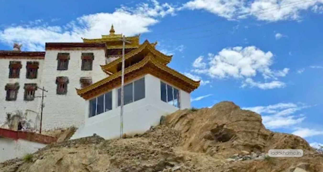 Panoramic view of Chemrey Monastery overlooking Ladakhi valleys with Himalayan peaks in the background