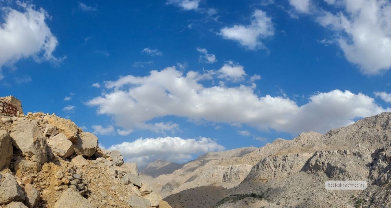 Scenic view of Khardung La pass with rugged terrain and Himalayas in Ladakh