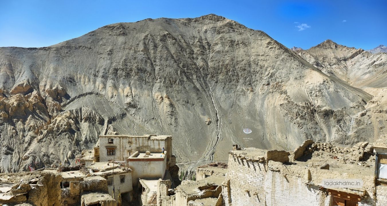 Panoramic landscape of Lamayuru Moonland showing barren hills and surreal formations