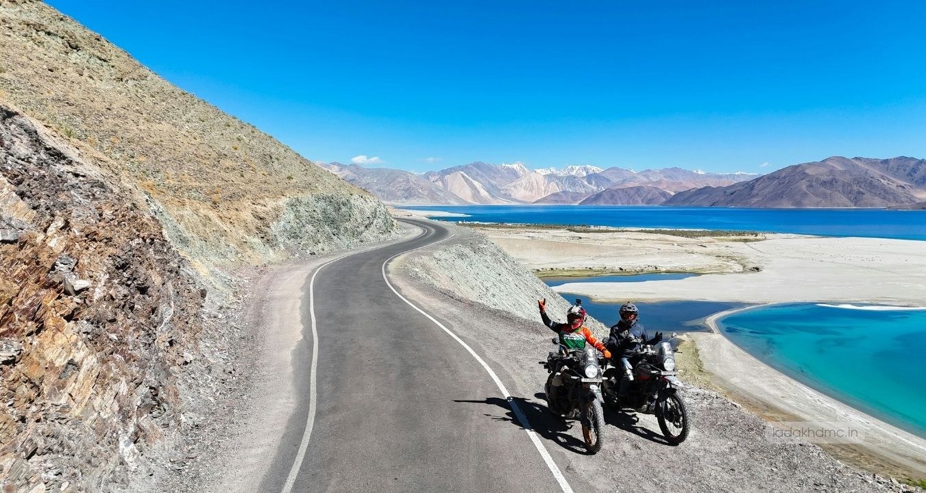 Pangong Tso surrounded by barren mountains and scenic Himalayan landscape in Ladakh