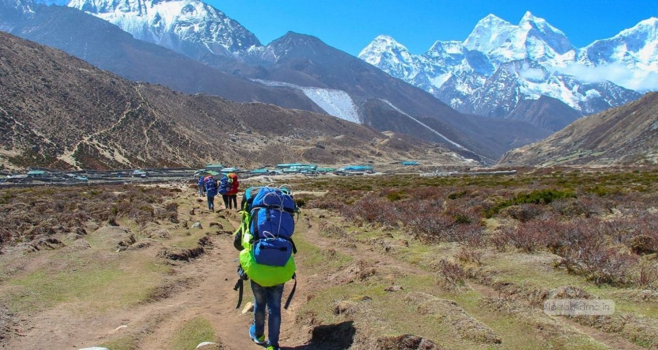 Trekking path at Stok Kangri Base Camp with snow-capped mountains around